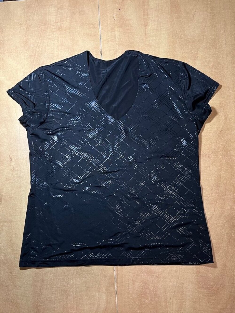 Women's Black Short-Sleeve V-Neck Tee with Subtle Detail